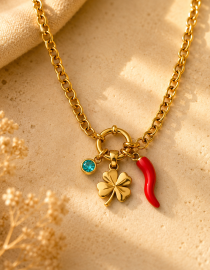 Stainless steel lucky charm necklace with four-leaf clover, red pepper charm and blue crystal